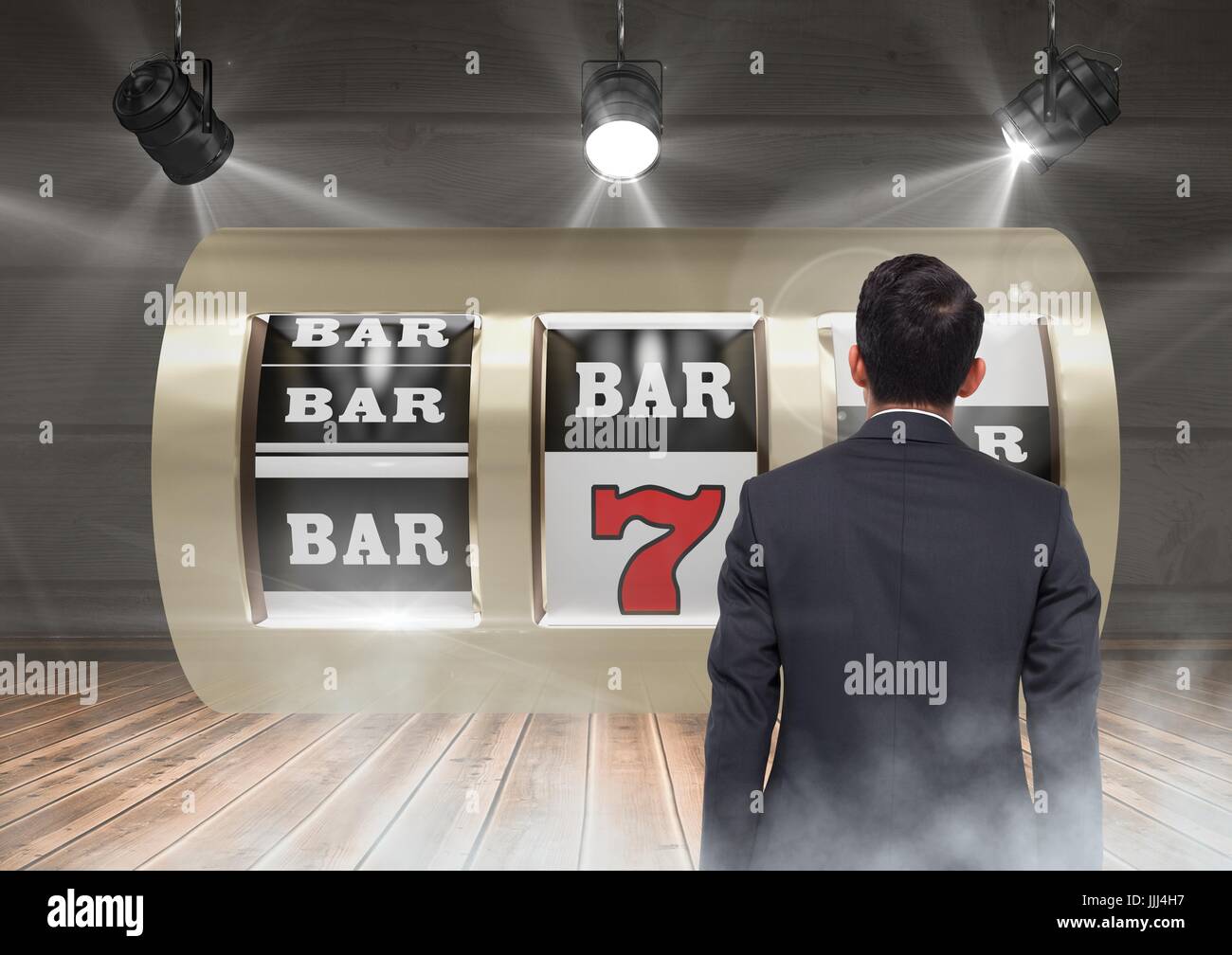 Back of Man Looking at 3d casino slot machine Stock Photo