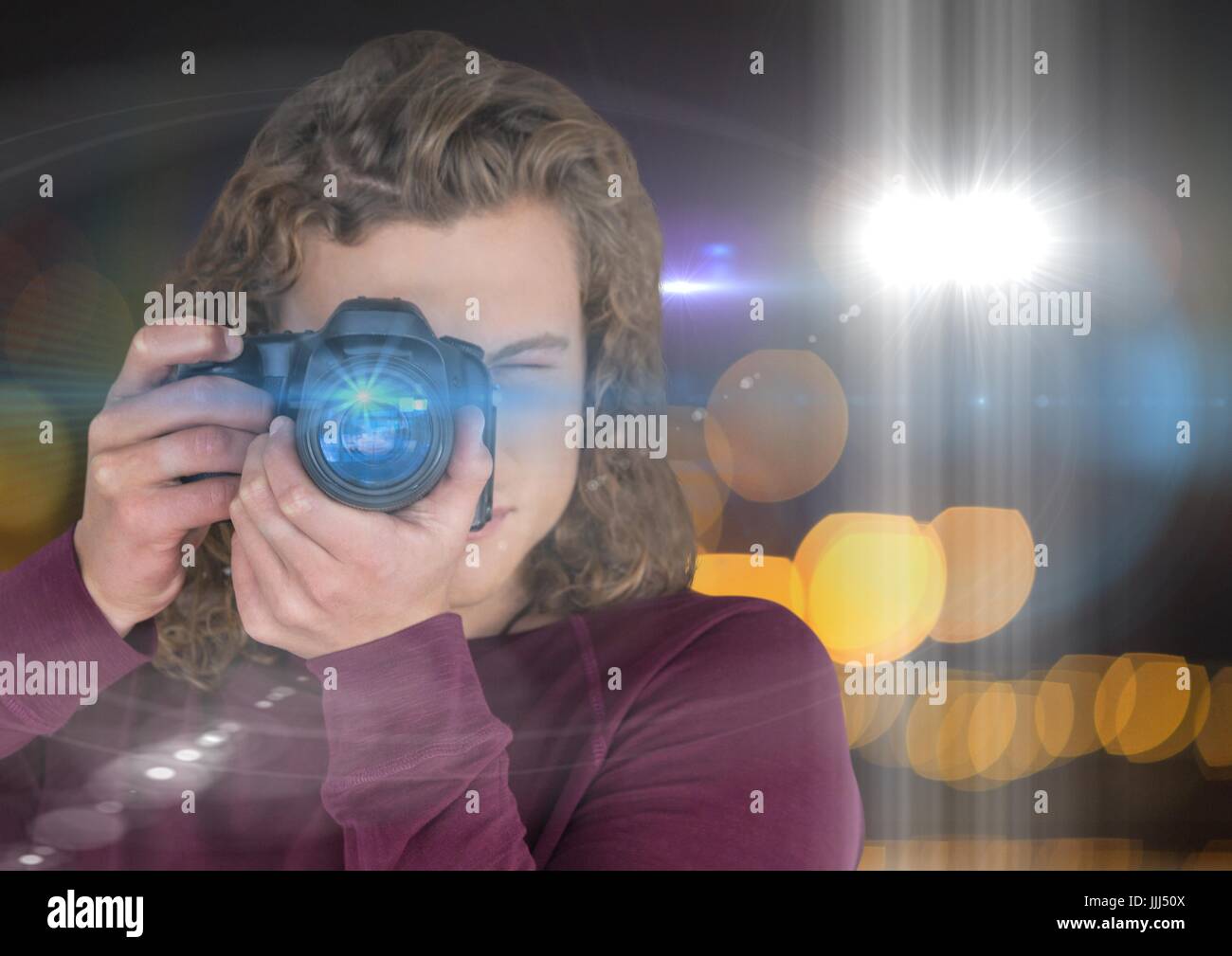 Photographer Man With Long Hair Taking A Photo Foreground