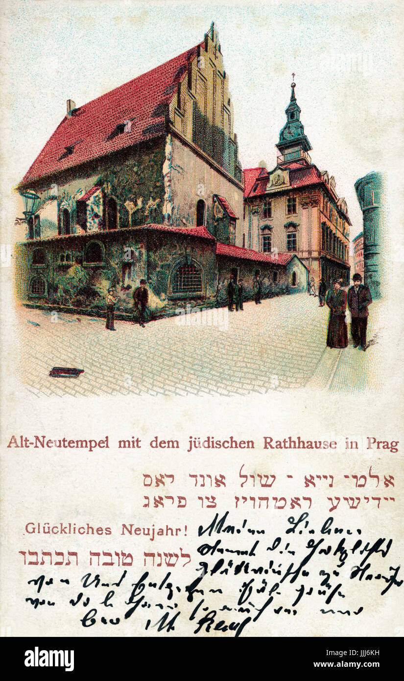 Alt-Neu synagogue / Old-New Synagogue Prague with the Jewish community centre. In Jewish quarter of Prague formerly the medieval ghetto.  New Year card with greetings in German 'Gluckliches Neujahr' in German and Hebrew.  Caption in German 'Alt-Neutempel mit dem judischen Rathhause in Prag'  and Yiddish. Couples walking along cobbled streets.  Kafka connection. Tinted postcard. Stock Photo