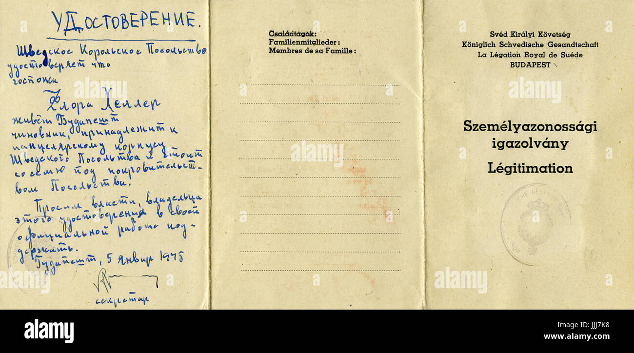 Embassy work pass of Julie Heller, protective document for Jewish member of staff of the Swedish embassy in Nazi-occupied Budapest, offering shelter on neutral Swedish territory, originally signed by Raoul Wallenberg 30 September 1944, handwritten Russian translation written on the back of the document signed on 5 January 1945 after Russian invasion (document originally in Hungarian and French). Document reads: the Royal Embassy of Sweden certifies that Mrs. Julie Heller living in Budapest, functionary attached to the personnel of the Swedish legation in Budapest, is under the protection of th Stock Photo