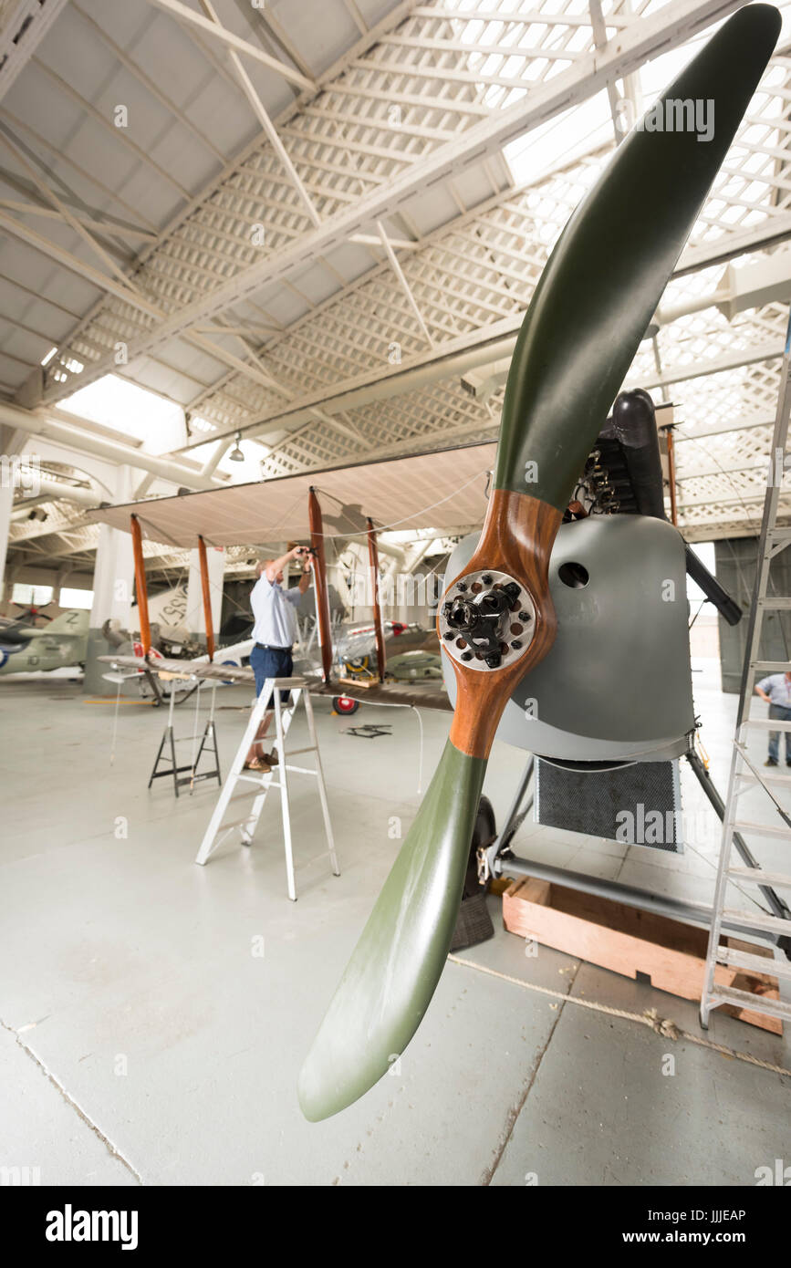 Duxford Cambridgeshire, UK. 20th July, 2017. A rare first World War De Havilland DH9 bomber aircraft has been fully restored and is now being assembled for display and flight at the Imperial War Museum. The plane is 100 years old, being assembled in a WW1 hanger on the 100th anniversary of the Imperial War Museum. The plane is the only one in the UK and has been restored after being found in an elephant stable at the Palace of Bikaner, Rajasthan, India. Credit: Julian Eales/Alamy Live News Stock Photo
