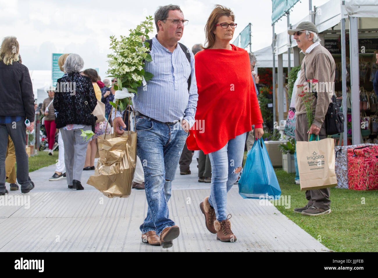 Knutsford, Cheshire. 20th July, 2017. Visitors and Exhibitors at the RHS Flower Show held at Tatton Park. The “garden party of the north”, first began in 1999 by the Royal Horticultural Society is getting underway at Tatton Park today as the RHS Flower Show opens its floral extravaganza to the general public. Credit; MediaWorldImages/AlamyLiveNews. Stock Photo