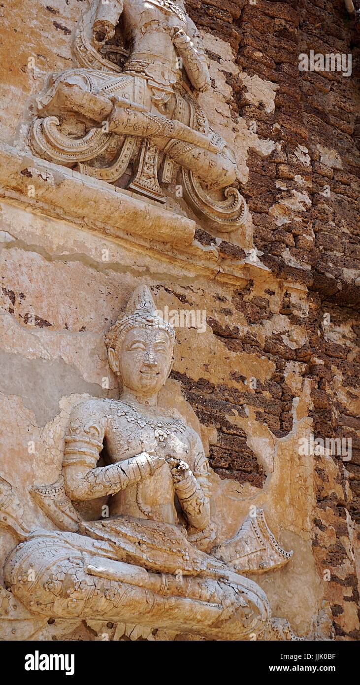 Old stuccos in Wat Ched Yot, Chiang Mai, Thailand. Stock Photo