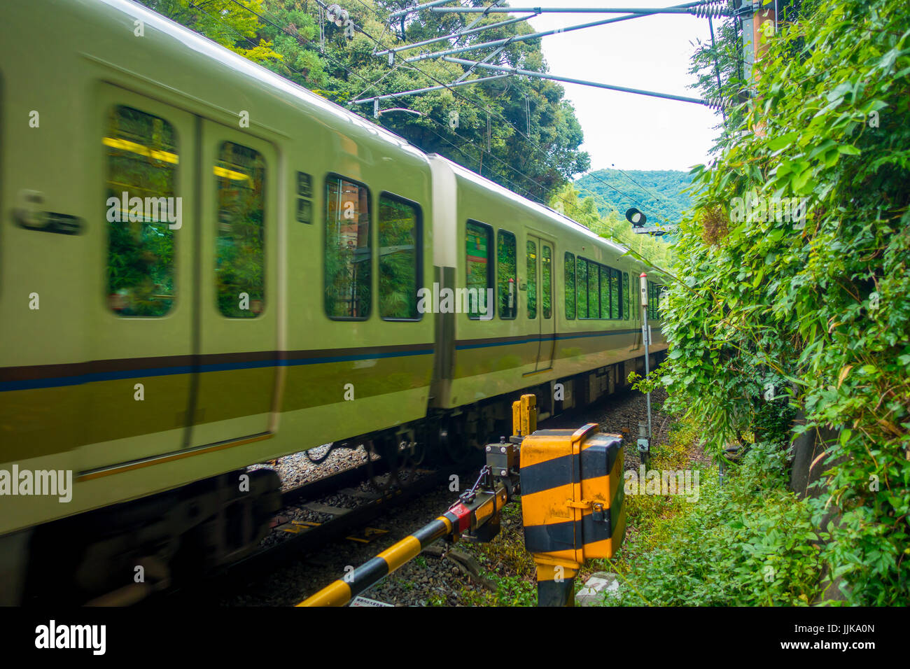 KYOTO, JAPAN JULY 05, 2017 Green train in the railway of Hakone Tozan cable train line at
