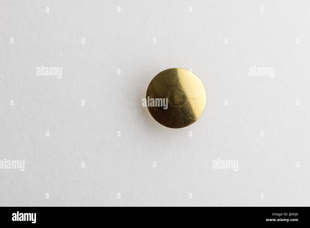Thumb Tack / Push Pin head with a white background Stock Photo