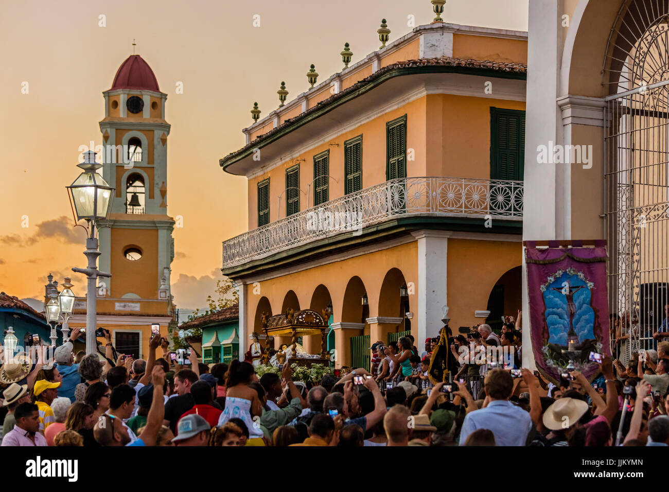 During EASTER known as SEMANA SANTA religious statues are paraded through town at dusk - TRINIDAD, CUBA Stock Photo