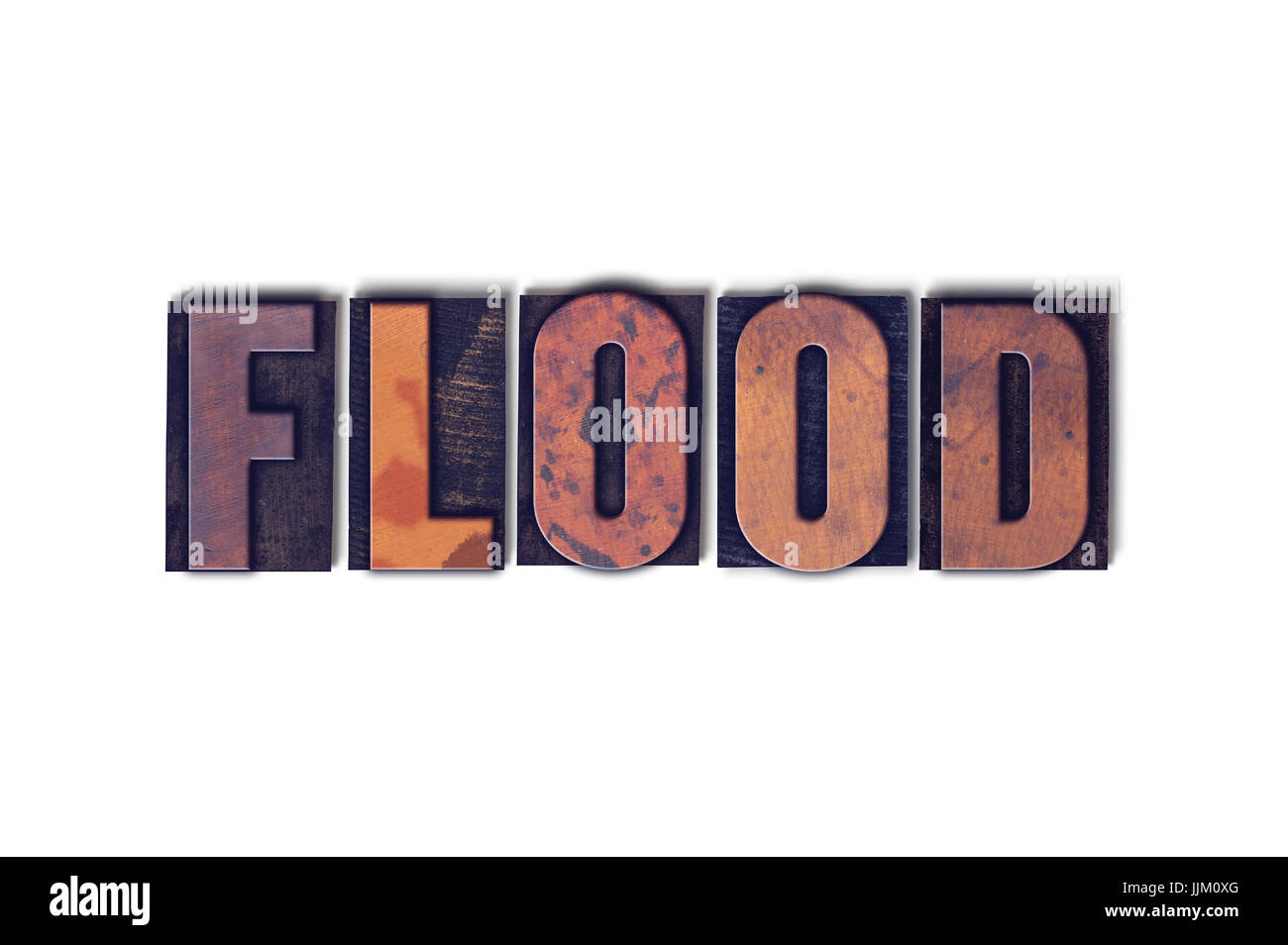 The word Flood concept and theme written in vintage wooden letterpress type on a white background. Stock Photo