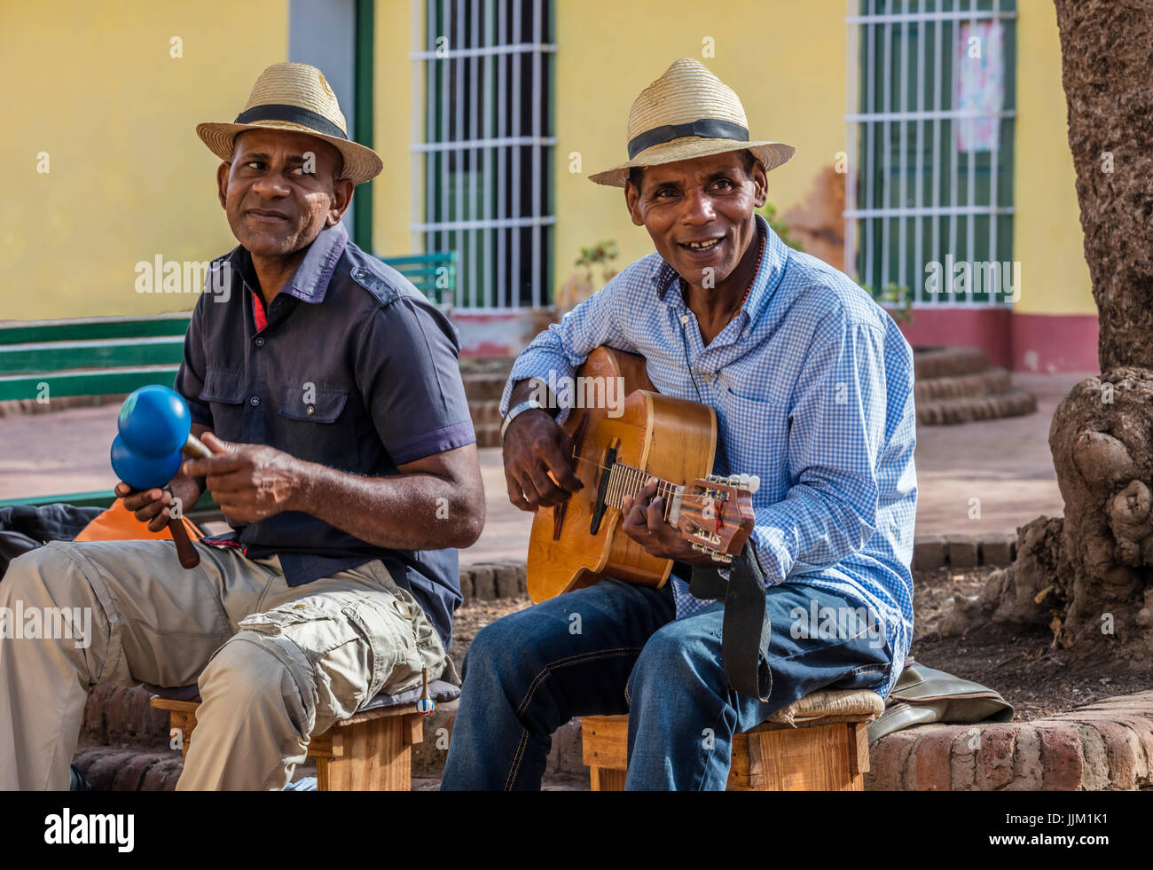 A CUBAN band plays traditional music in a courtyard - TRINIDAD, CUBA Stock Photo