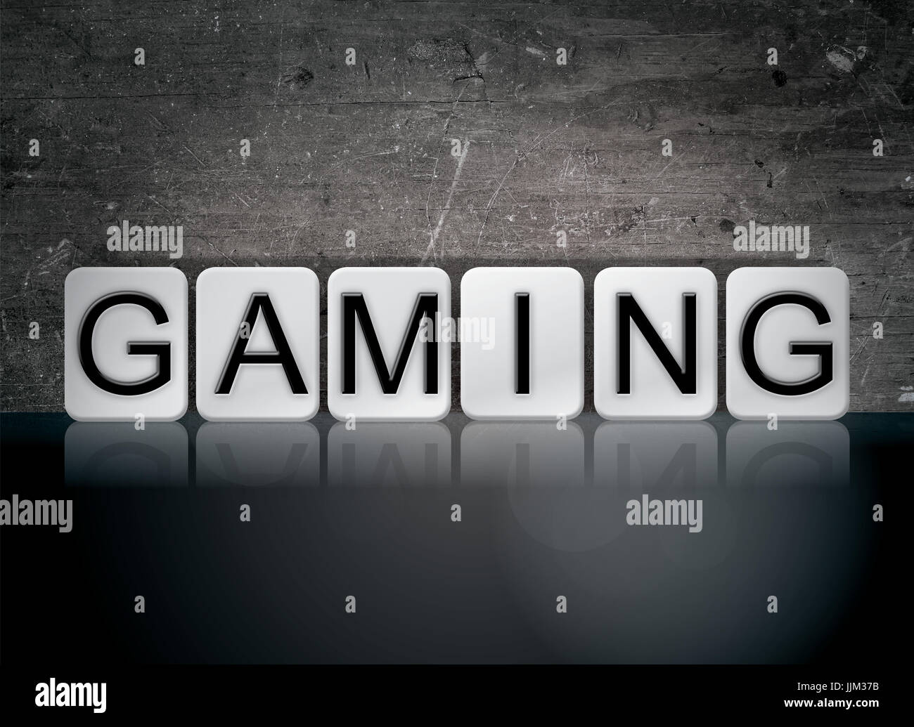 The Word Gaming Concept And Theme Written In White Tiles On A Dark Background Stock Photo Alamy