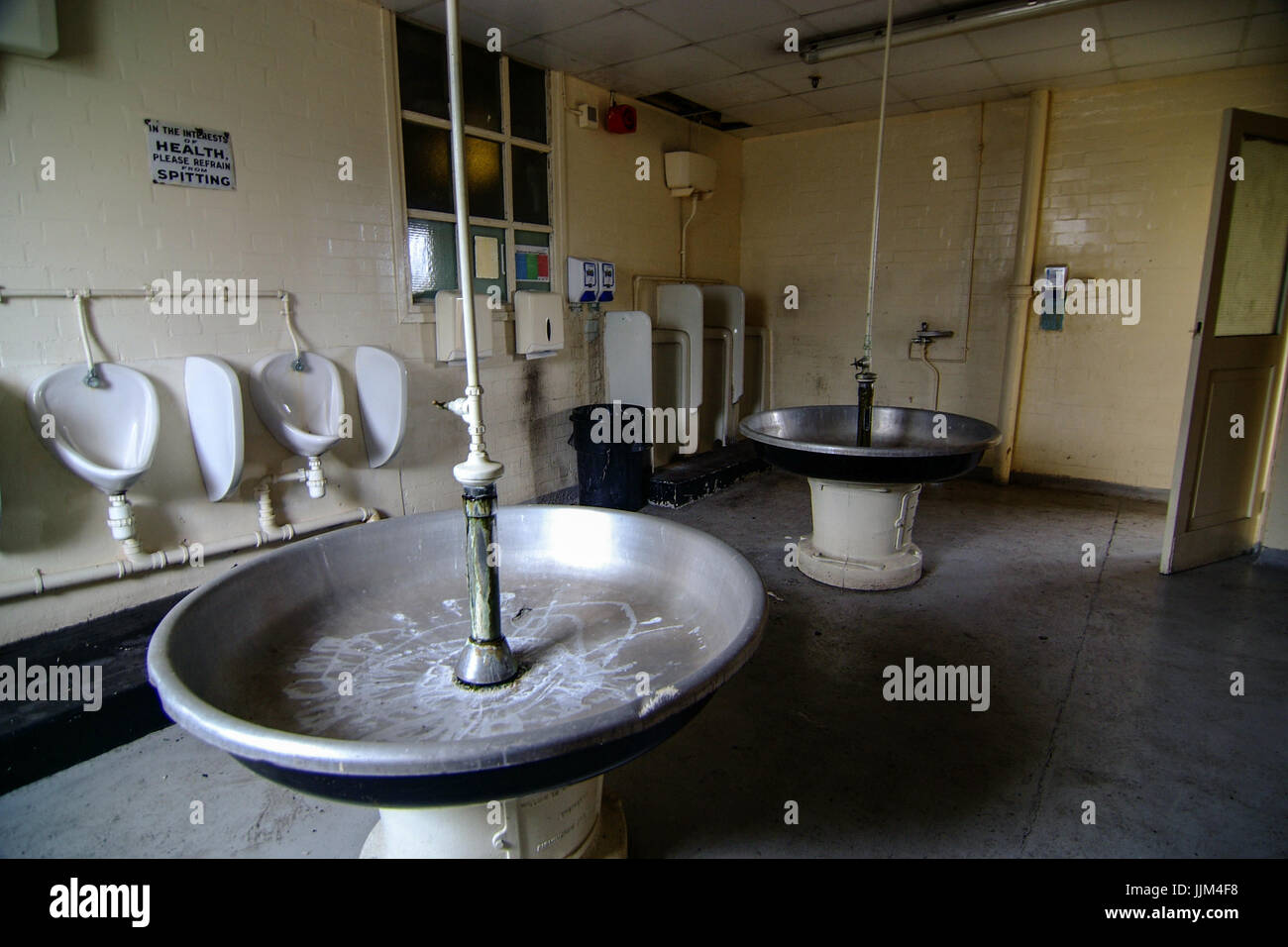 Old toilet blocks in the abandoned MG Rover car factory in Longbridge