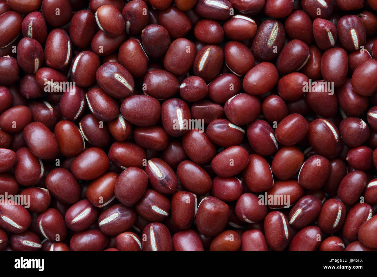 Background of dry adzuki beans isolated on white. Stock Photo