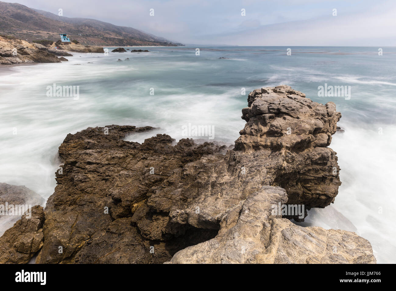 Leo Carrillo State Beach rocky point with motion blur surf in Malibu