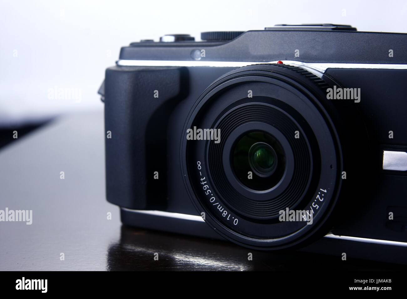 Photo of a digital mirrorless camera Stock Photo