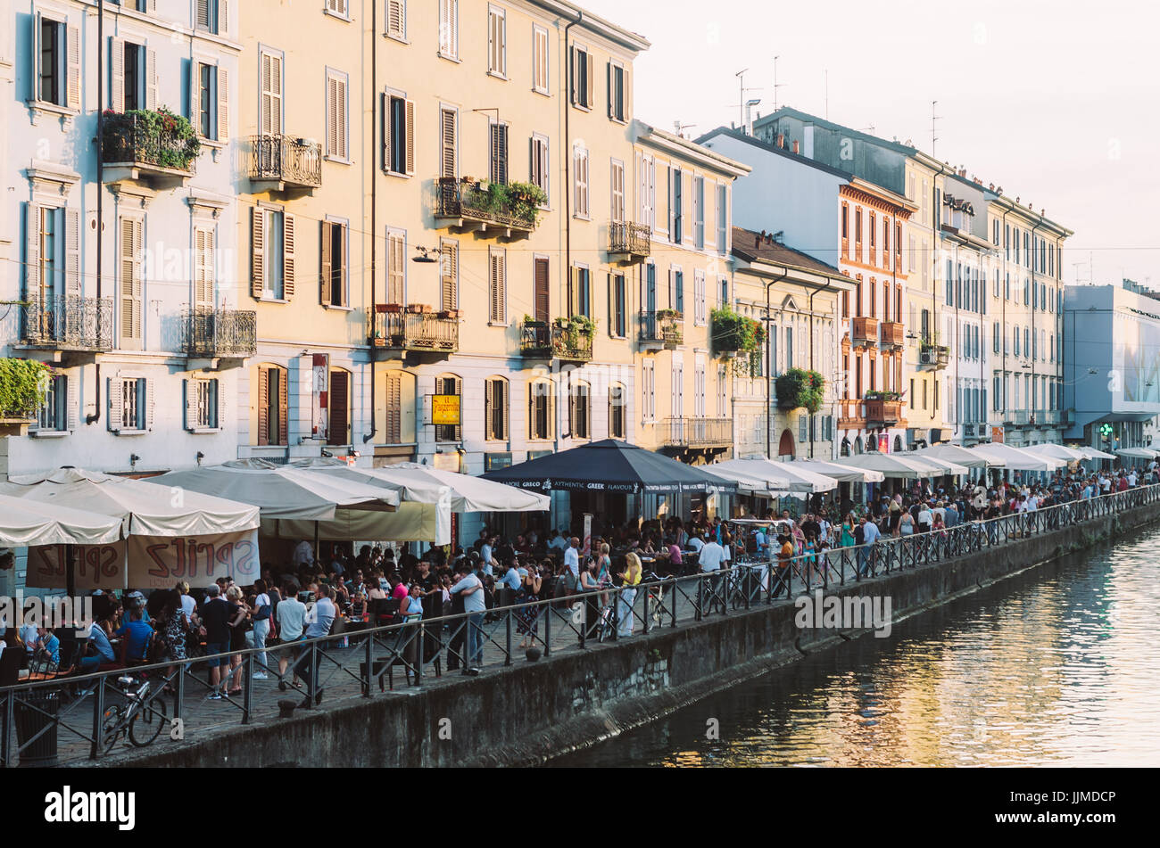 Navigli district is a popular hangout for the Milanese pastime of the " aperitivo Stock Photo - Alamy