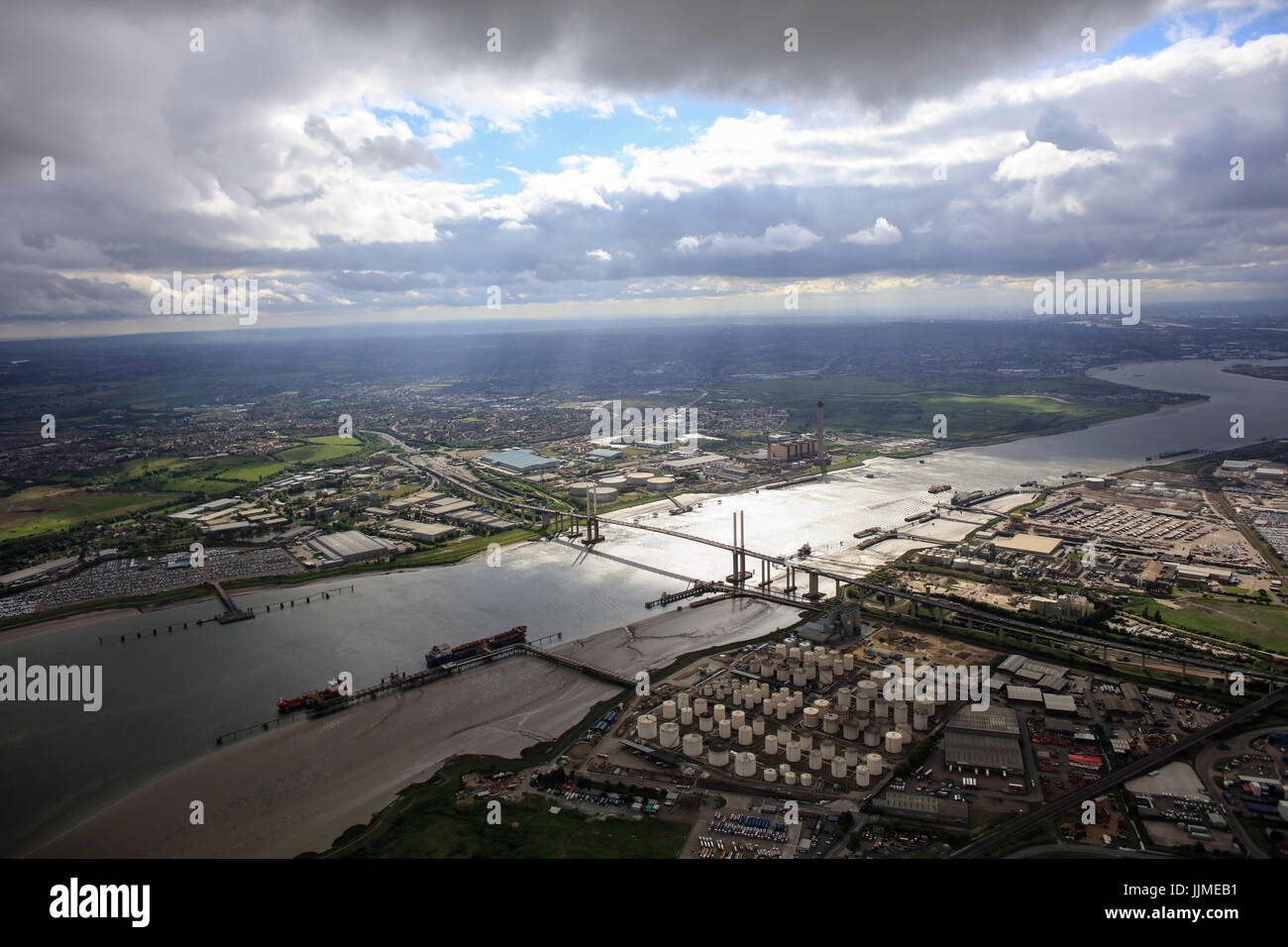 An aerial view showing the QE2 Bridge over the River Thames at Thurrock illuminated by sunlight Stock Photo
