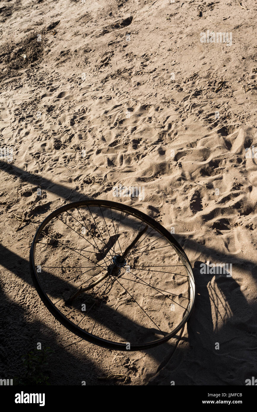 Traditional toy of African children. Bicycle wheel Stock Photo - Alamy