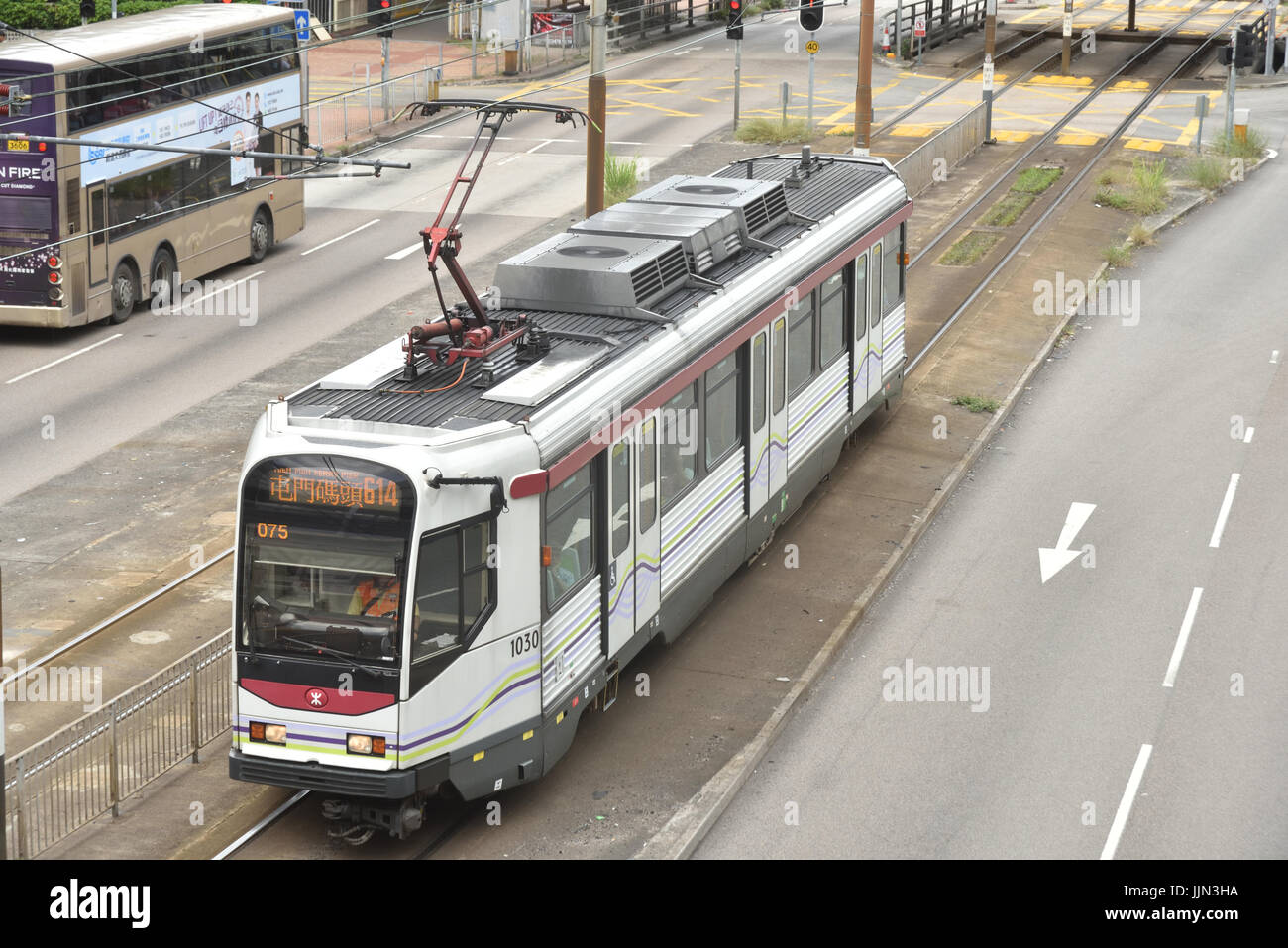 Tram of the Light Rail Transit System which offers swift services between areas of Yuen Long and Tuen Mun districts. Stock Photo