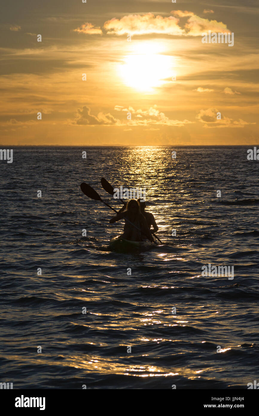Canoe at sunset, Gangehi Island, Ari Atoll, Indian Ocean, Maldives Stock Photo