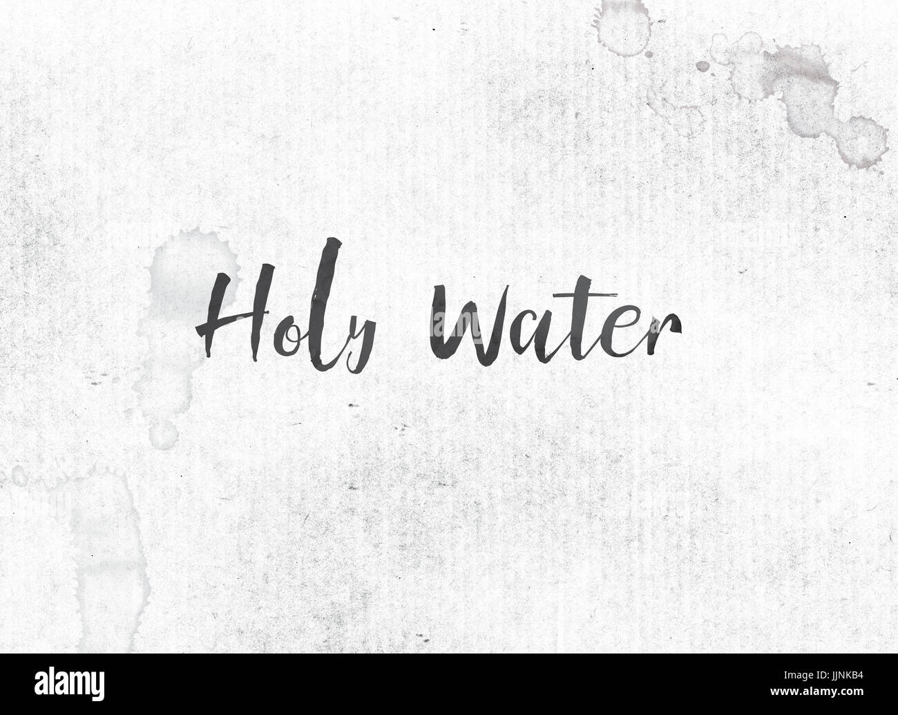 The words Holy Water concept and theme painted in black ink on a