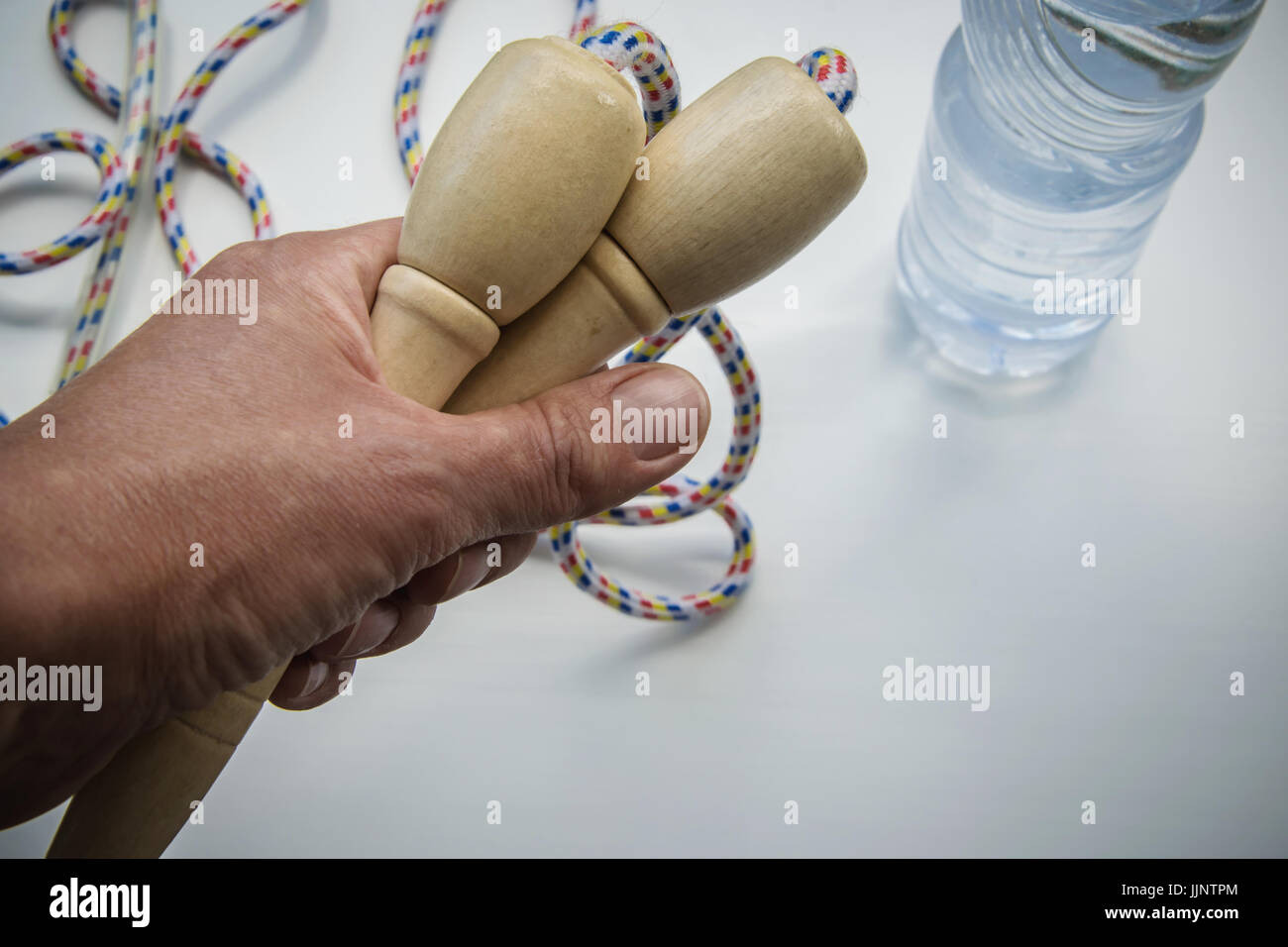 Holding a jump rope Stock Photo - Alamy