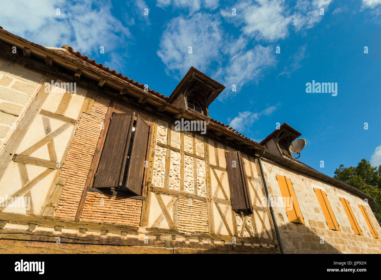 Half-timbered building in this old village on the Dropt River near Duras; Allemans-du-Dropt; Lot-et-Garonne; Aquitaine, France Stock Photo