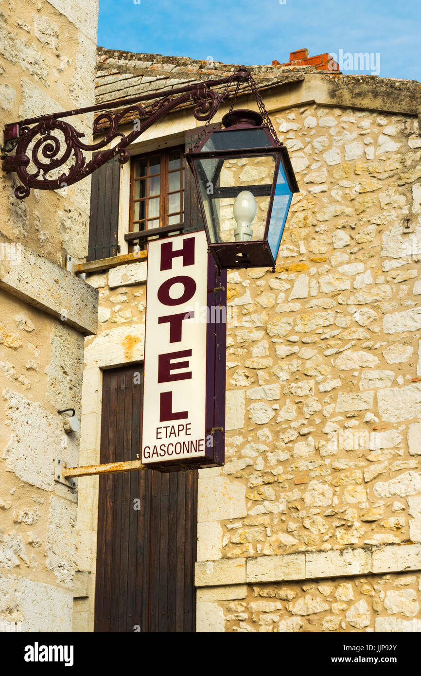 Old street lamp and hotel sign in this historic Dropt Valley village. Allemans-du-Dropt; Lot-et-Garonne; Aquitaine; France Stock Photo
