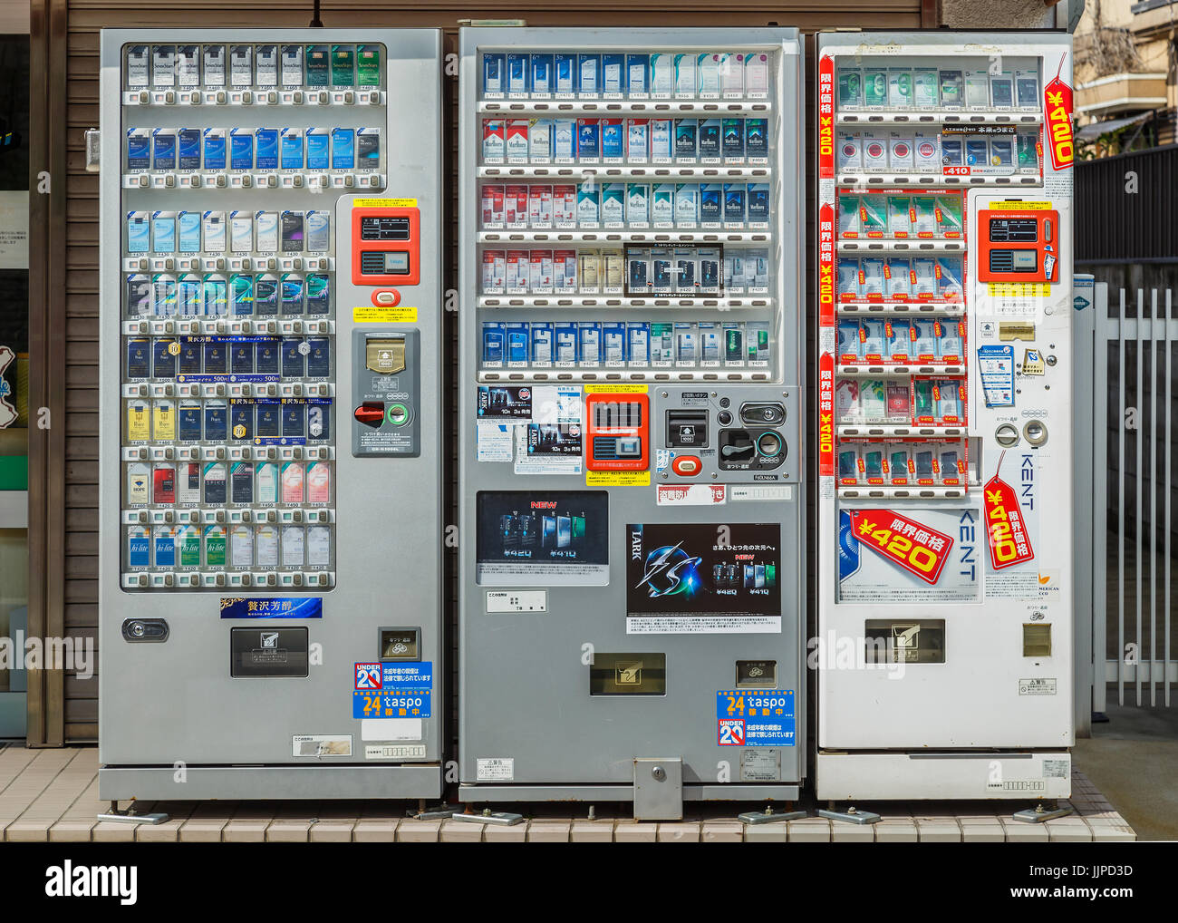 KYOTO, JAPAN - OCTOBER 21:  Cigarette vending machine  in Kyoto, Japan on October 21, 2014. People can buy a pack of cigarette by inserting the I.D. c Stock Photo