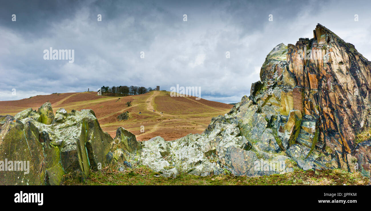 Bradgate Park in Leicestershire showing one of the many granite outcrops as well as Old John and the war memorial. Stock Photo