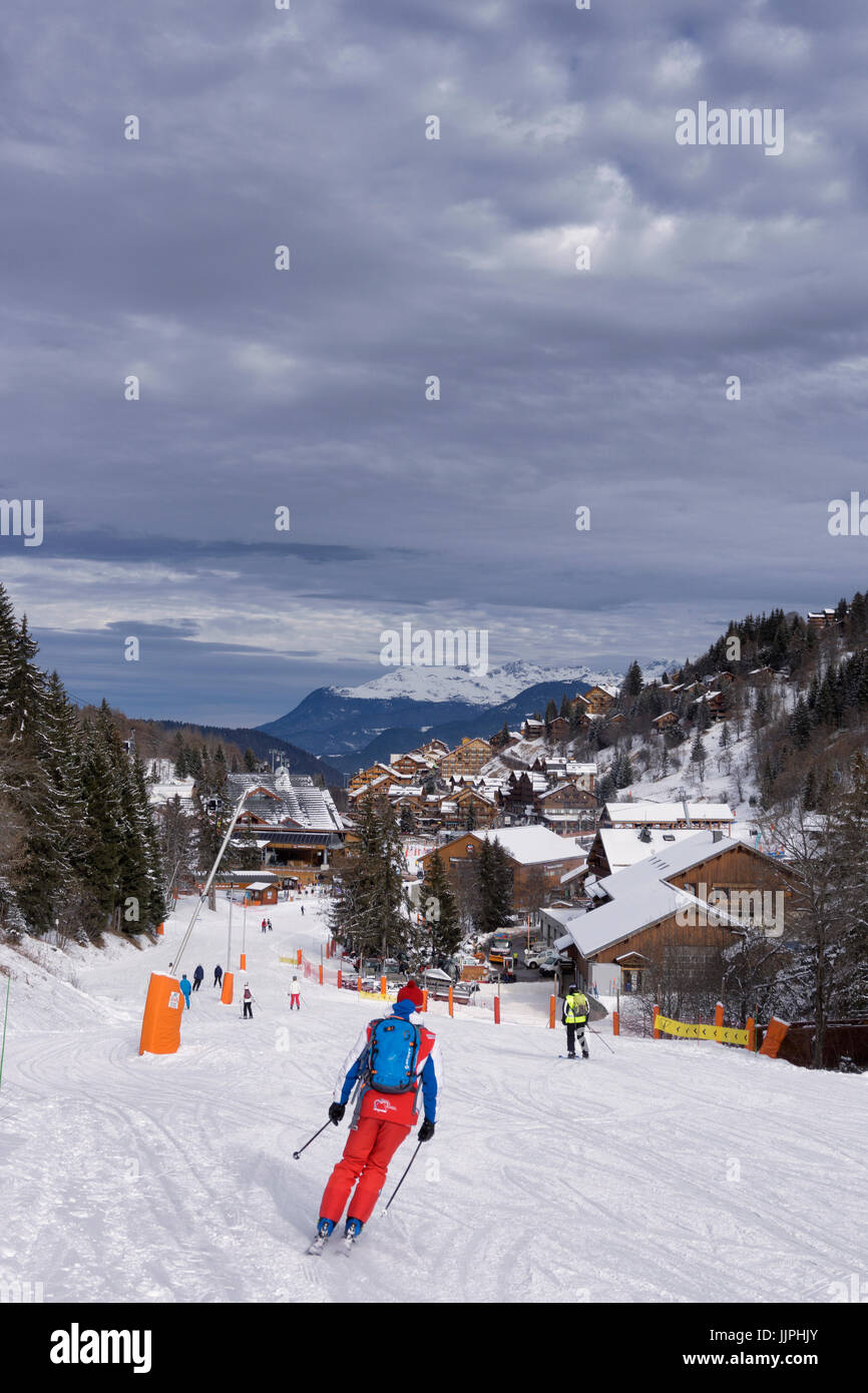 Skiers approaching Meribel. Stock Photo