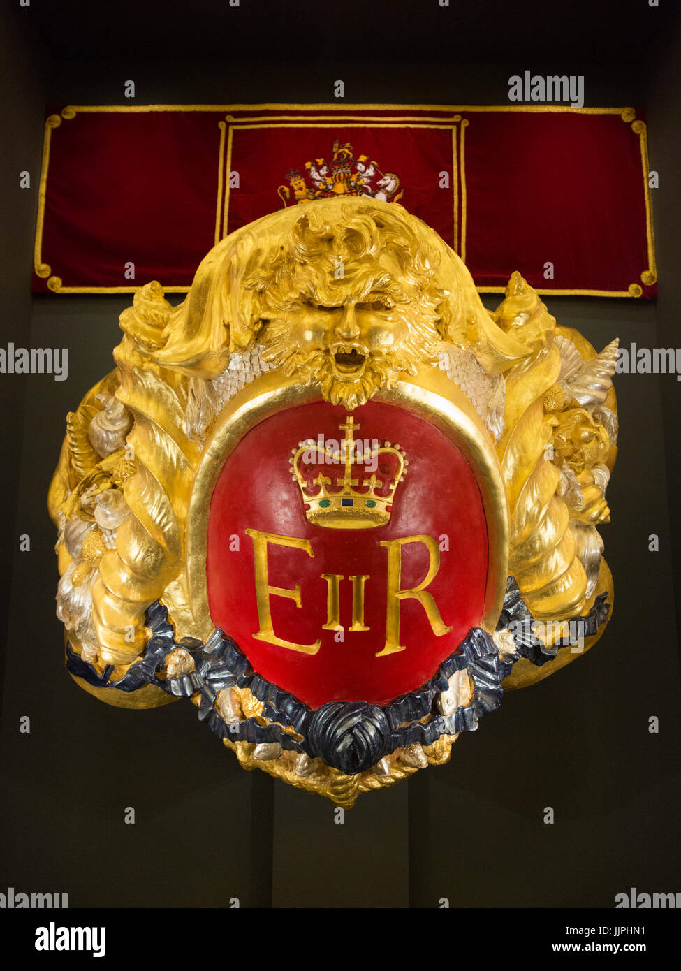 *** EMBARGOED to 00:01 BST, FRIDAY, 21 JULY 2017 *** Pictured: Velvet hanging of the United Kingdom's coat of arms taken from MV Spirit of Chartwell, when used as the Royal Barge. From the Thames Diamond Jubilee Pageant, 2012. This summer, visitors to the State Rooms at Buckingham Palace wiill enjoy a special display of more than 200 gifts presented to Her Majesty The Queen throughout her 65-year reign and a special tribute to Diana, Princess of Wales. The State Rooms are open to the public from 22 July to 1 October 2017. Stock Photo