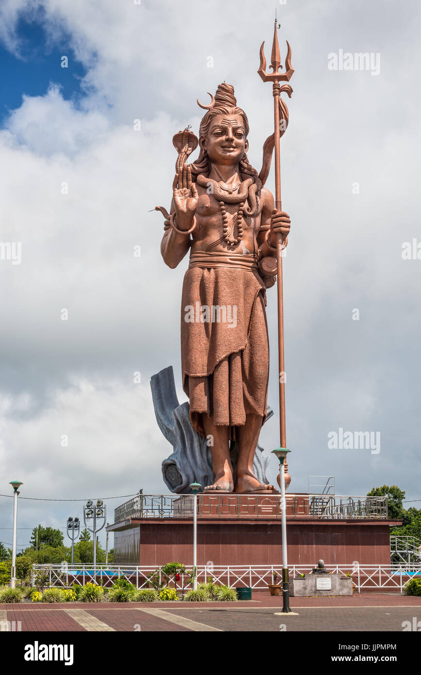 Grand Bassin, Mauritius - December 26, 2017: Mangal Mahadev - Shiva Statue, 33 m tall Hindu god, standing at the entrance of Ganga Talao - Grand Bassi Stock Photo