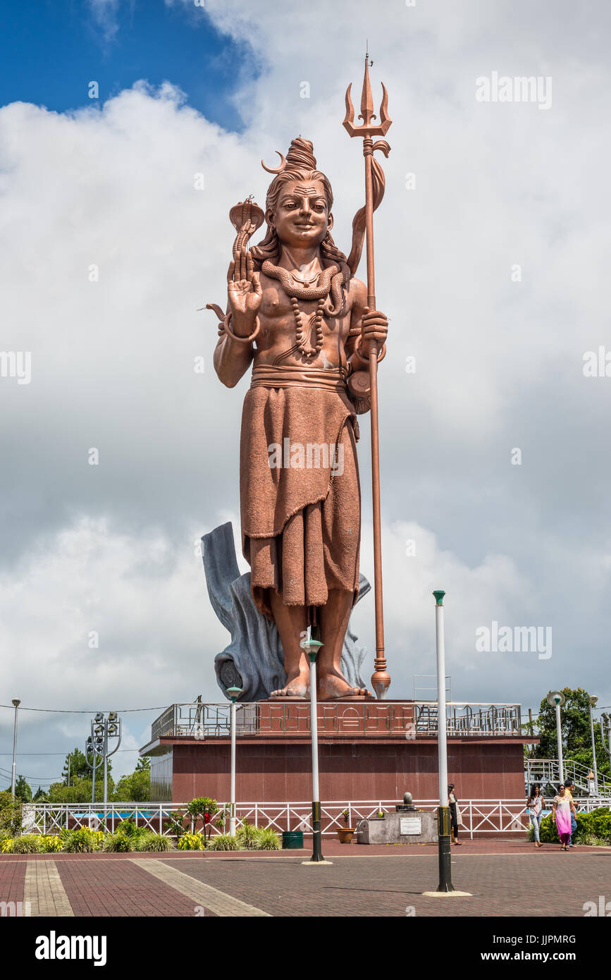 Grand Bassin, Mauritius - December 26, 2017: Mangal Mahadev - Shiva Statue, 33 m tall Hindu god, standing at the entrance of Ganga Talao - Grand Bassi Stock Photo