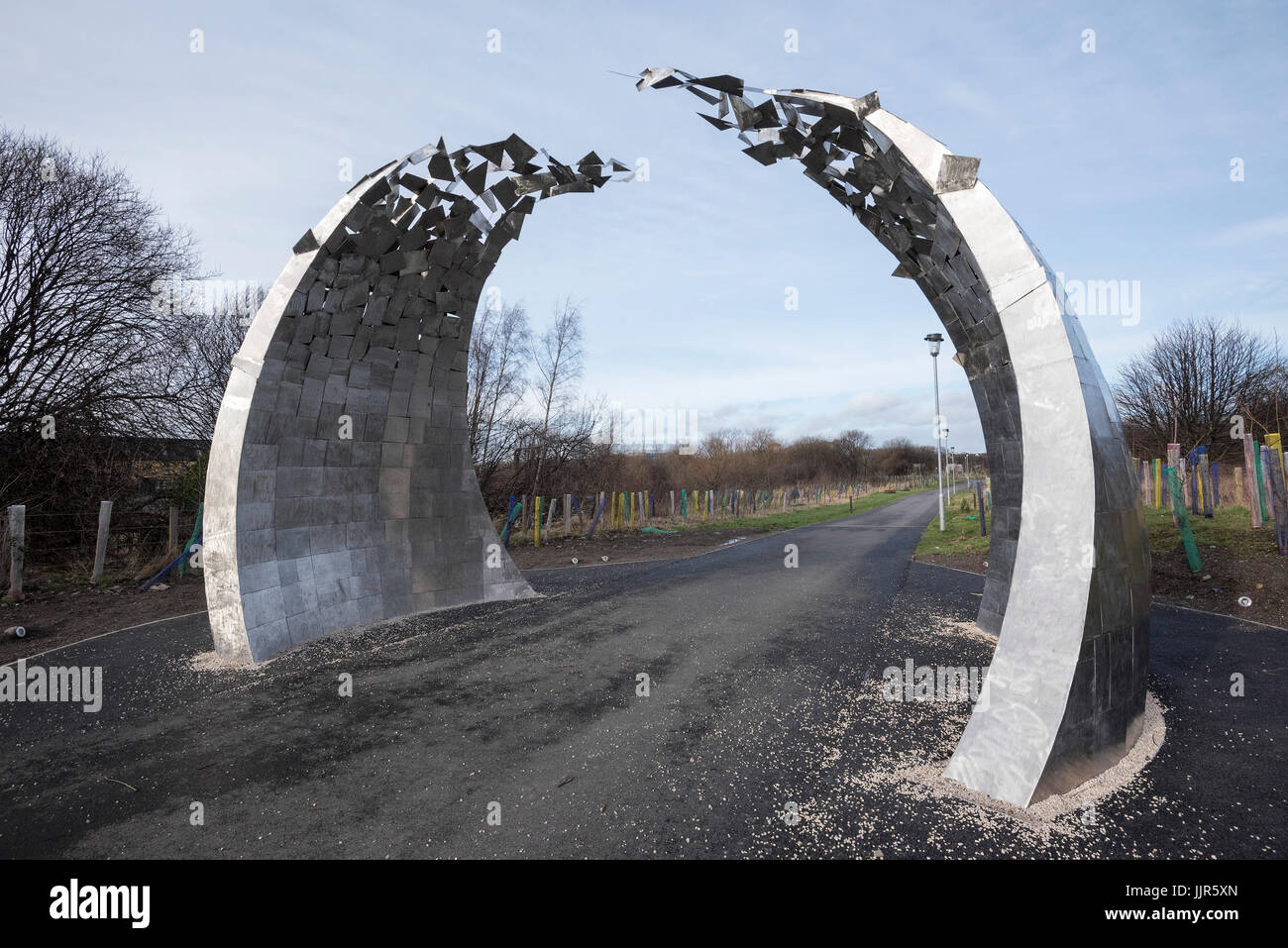 The 'Evolve' sculpture at the entrance to Cunningar Loop woodland park in Glasgow. Stock Photo