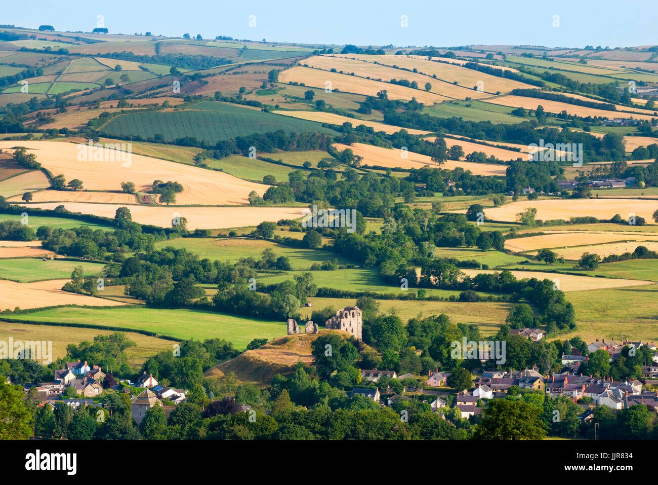 Clun and the castle ruins nestling in the south Shropshire countryside. Stock Photo