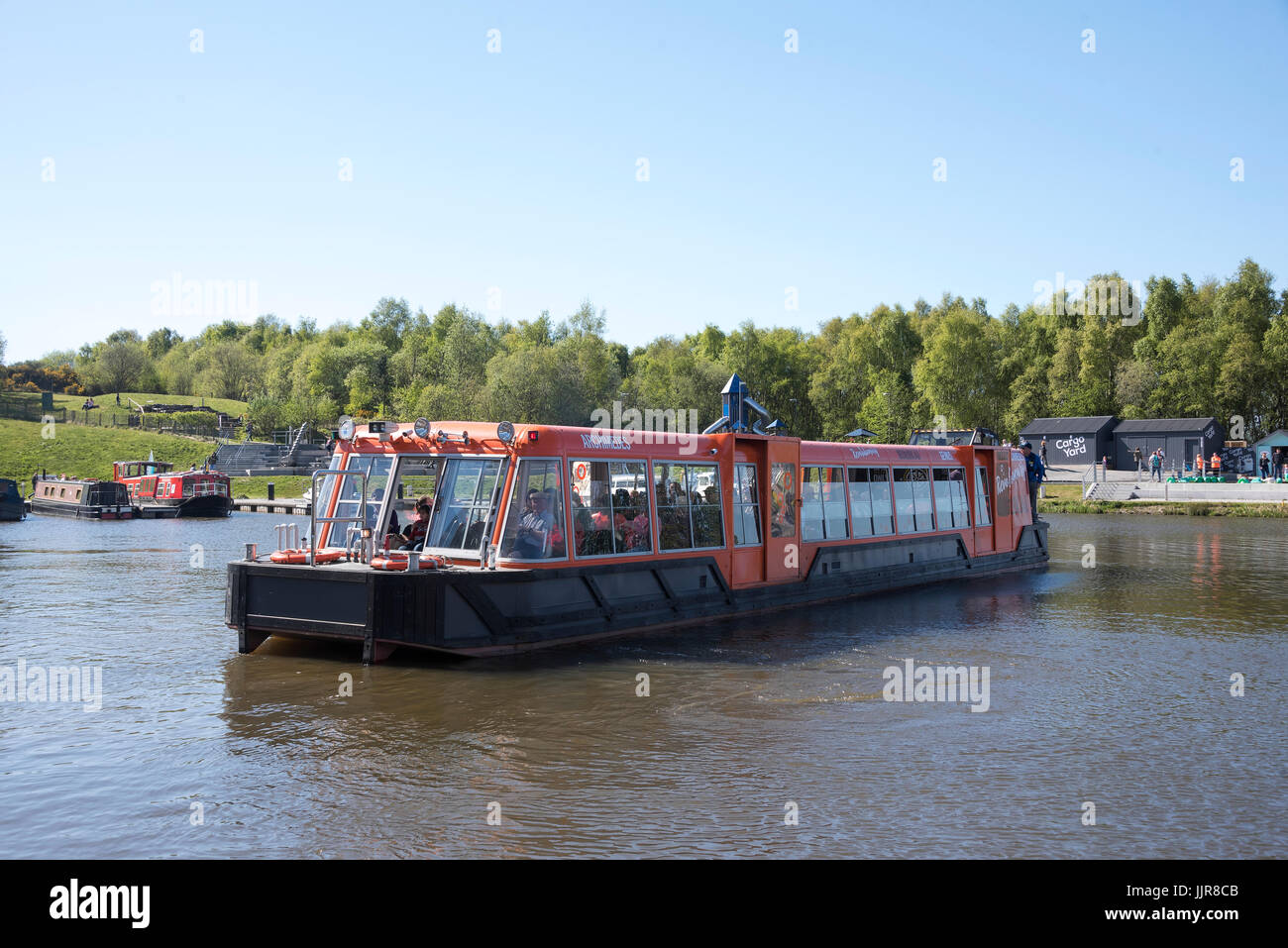 Boat trip visitor attraction on the Forth & Clyde and Union canals at the Falkirk Wheel. Stock Photo