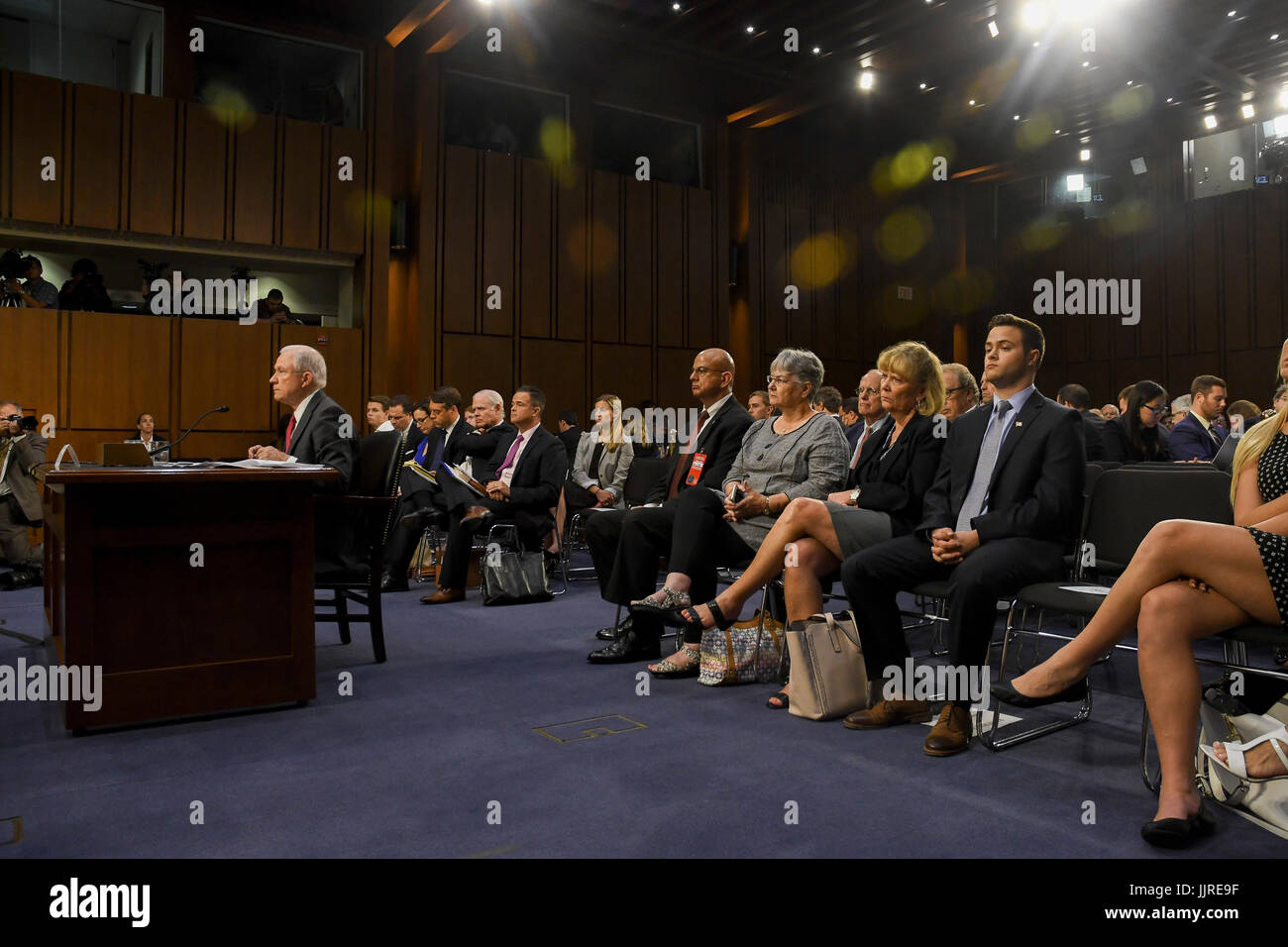 US. Attorney General Jeff Sessions with his family seated in the front row behind him in the Hart Senate Office building during his testimony in front of the Senate Intelligence  Committee, Washington DC, June 13, 2017. Stock Photo