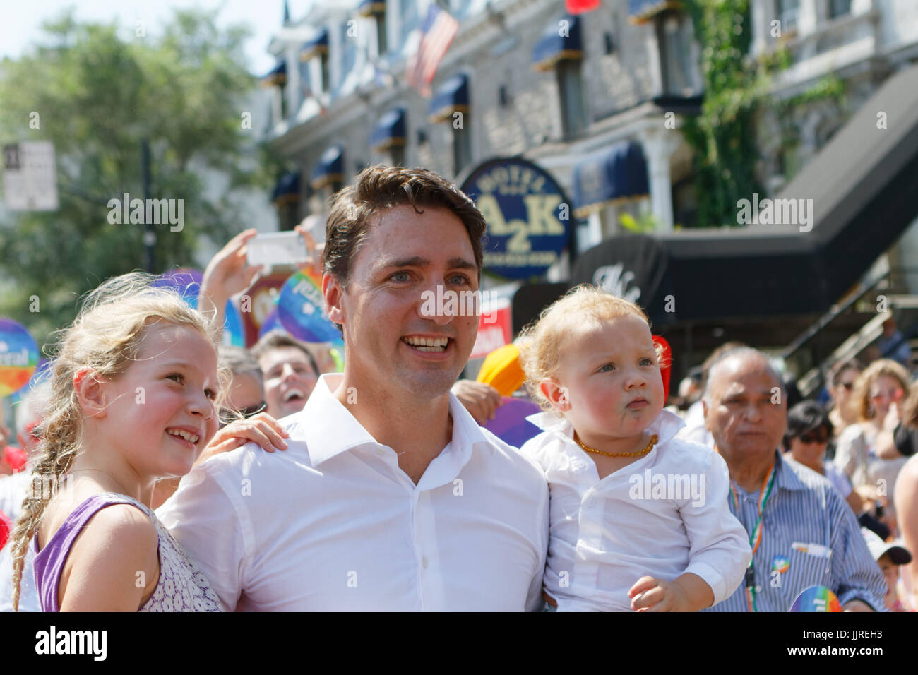 Justin Trudeau, leader of the Liberal party of Canada walks in the Pride parade in Montreal with his two children Stock Photo