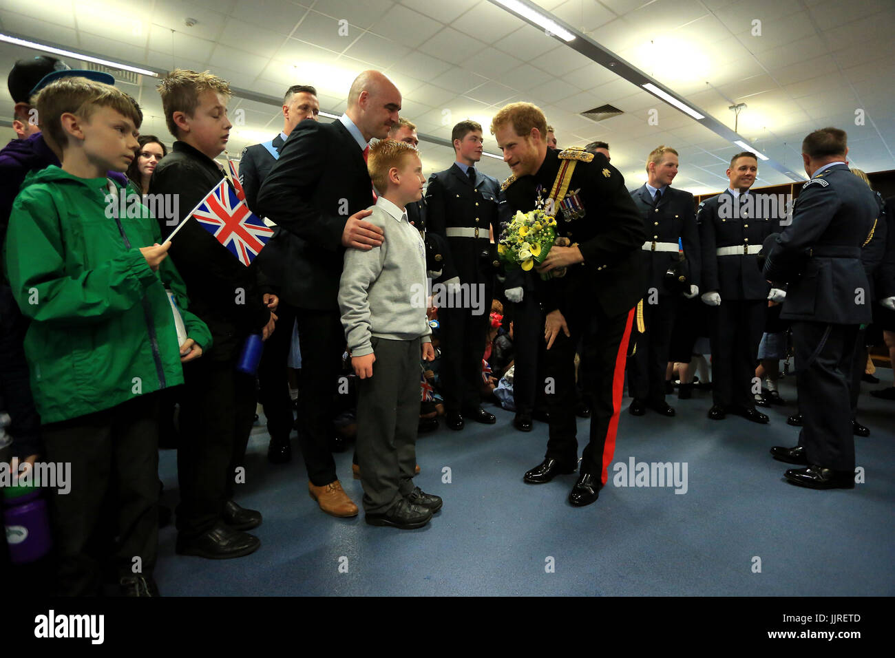 Prince Harry meets Jordan Brown and his son Sam during an official visit to RAF Honington in Bury St Edmunds. Stock Photo