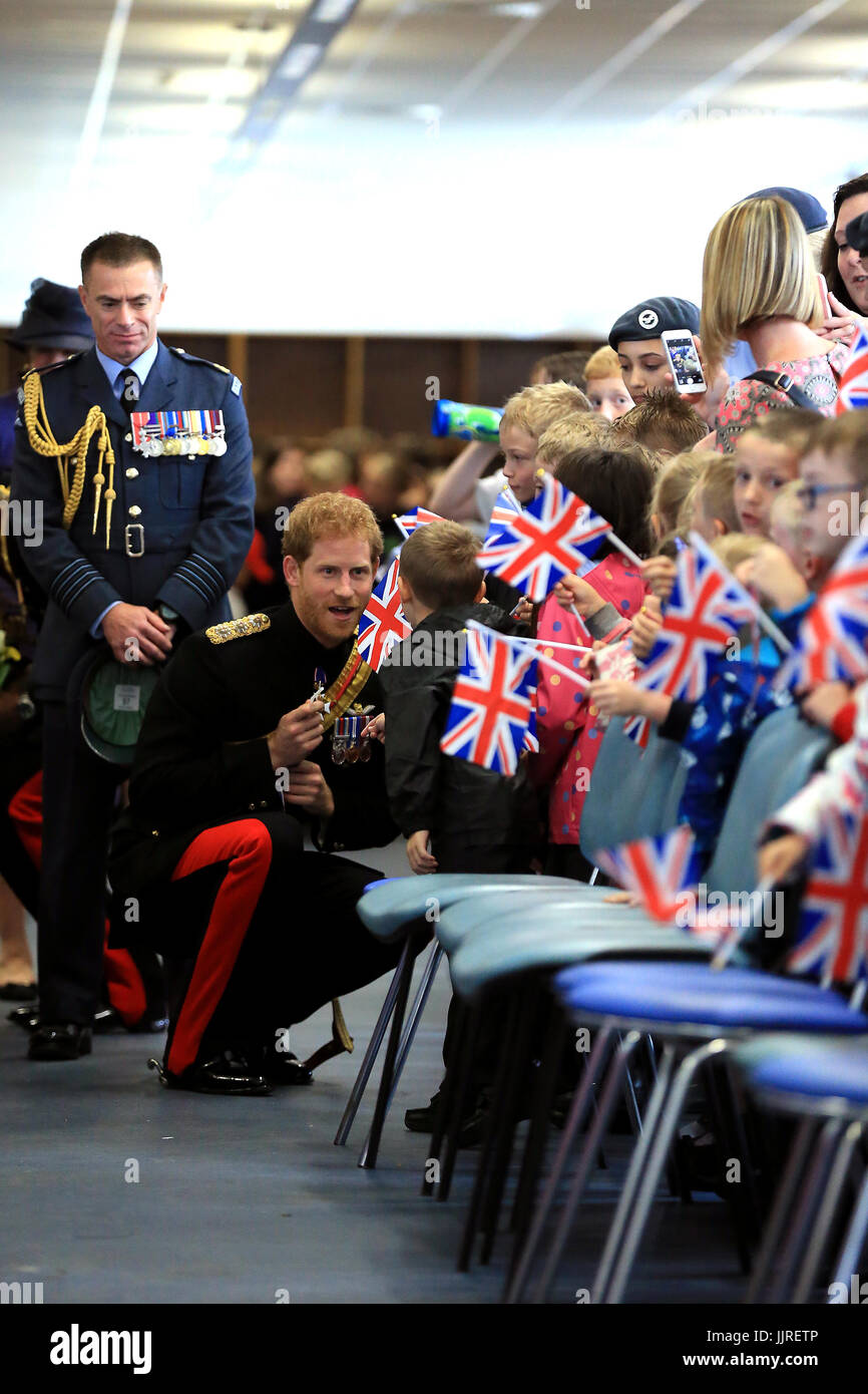 Prince Harry meets schoolchildren during an official visit to RAF Honington in Bury St Edmunds. Stock Photo