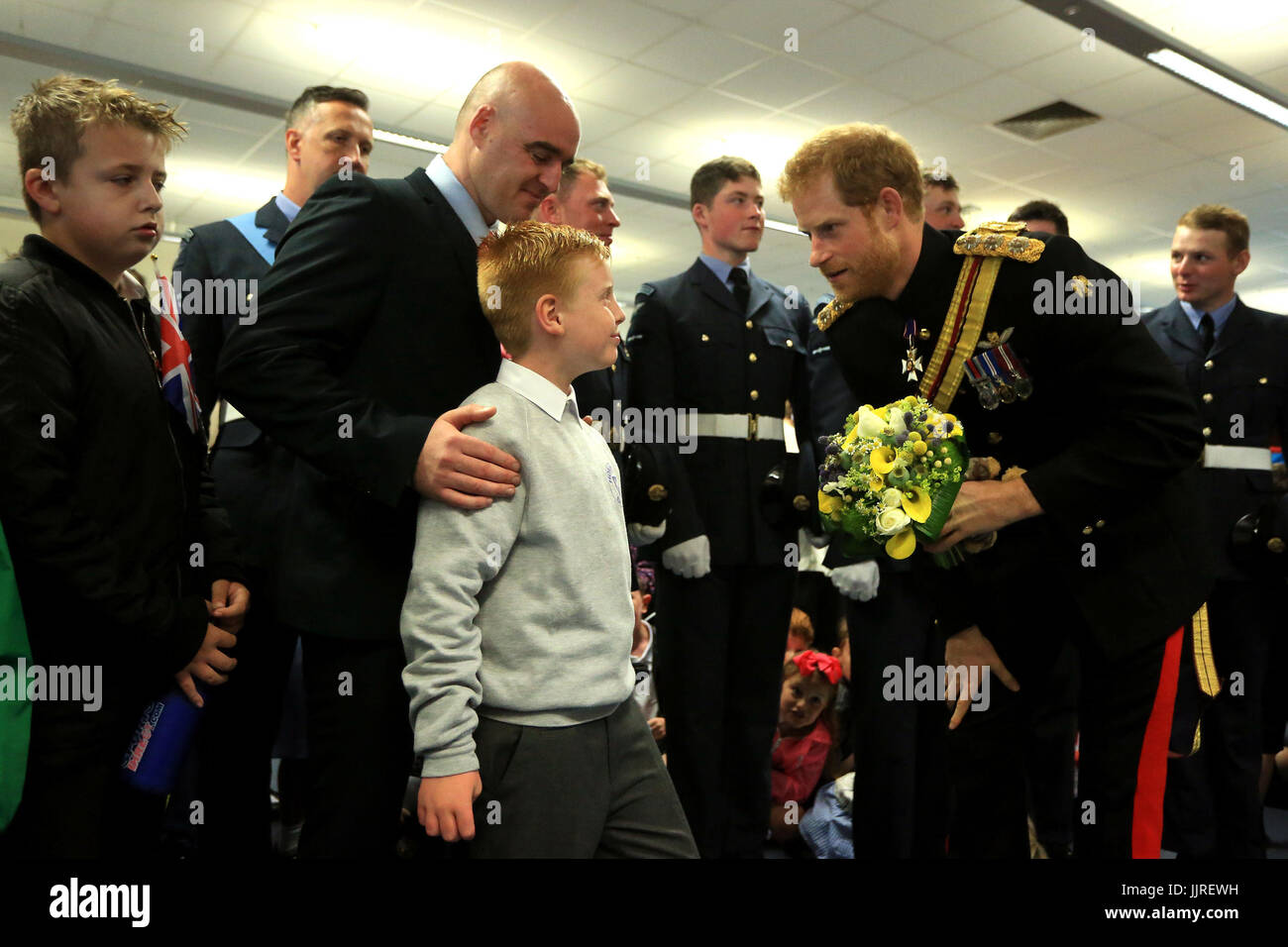 Prince Harry meets Jordan Brown and his son Sam during an official visit to RAF Honington in Bury St Edmunds. Stock Photo
