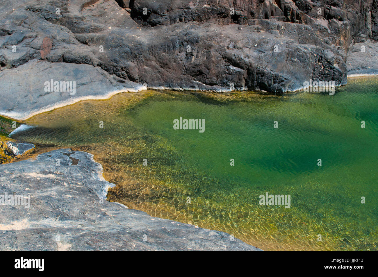 The Dirhur mountain lake in the Dragon Blood trees forest in the protected area of Dixam Plateau on the island of Socotra, Unesco world heritage site Stock Photo