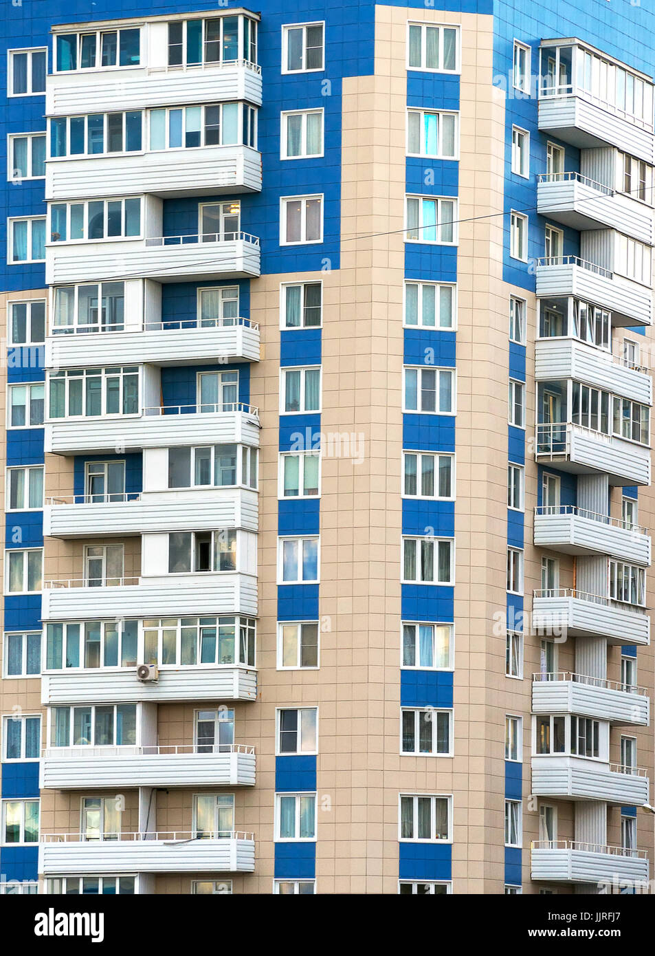 Portrait of apartment building with balconies Stock Photo - Alamy