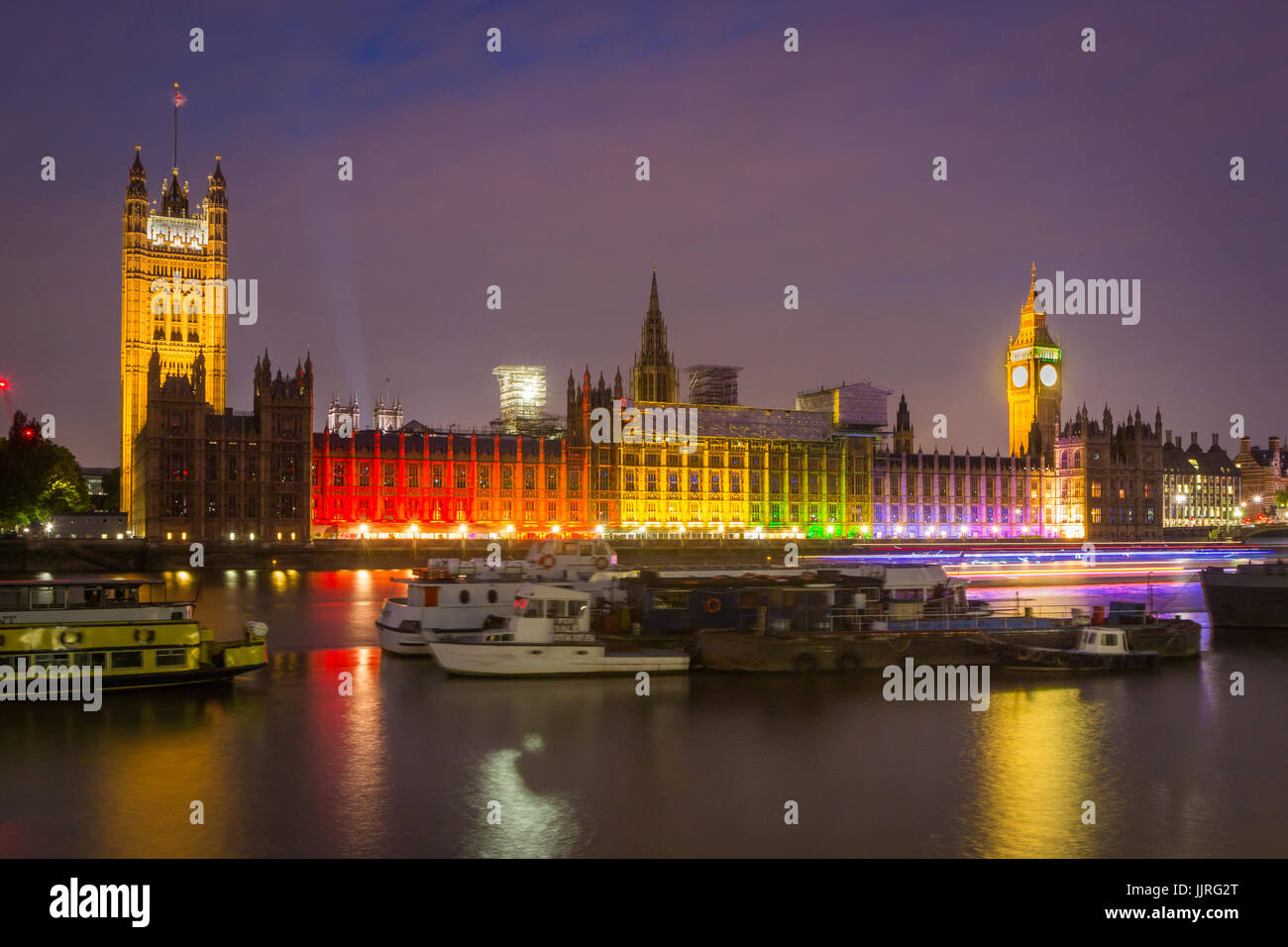 Palace of Westminster lit up in rainbow lights to mark London's Gay Pride  celebrations Stock Photo - Alamy