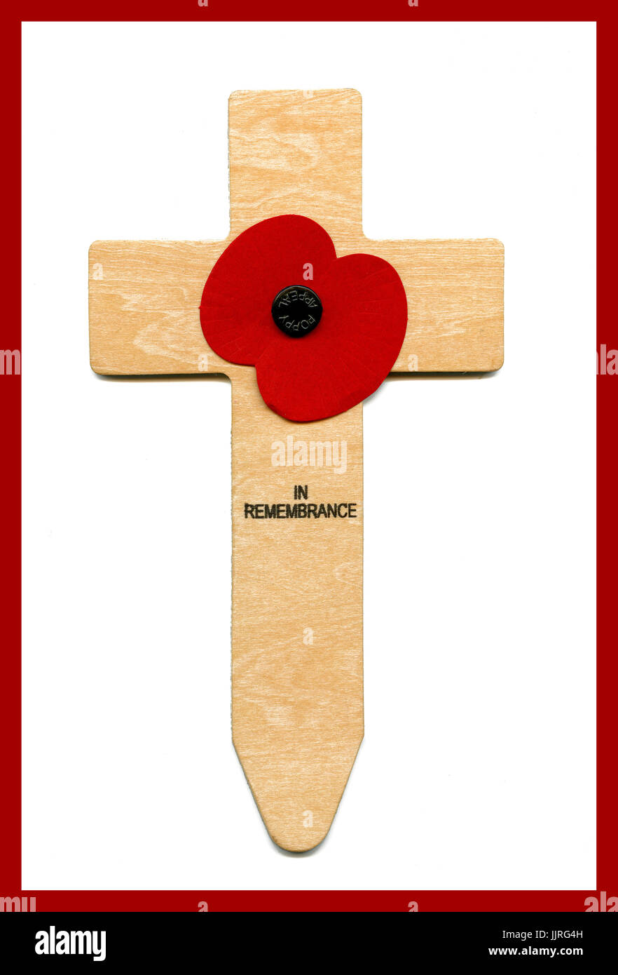 The Remembrance Cross Symbol. 7″ in height made from  plywood.  It has a poppy attached with the words ‘In Remembrance’ printed below the poppy. Annual Remembrance Day 11th November Stock Photo