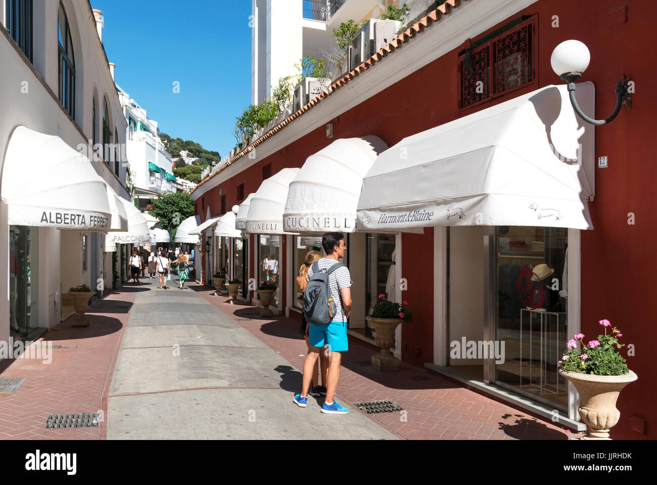 visitors to capri looking in the designer shops Stock Photo Alamy