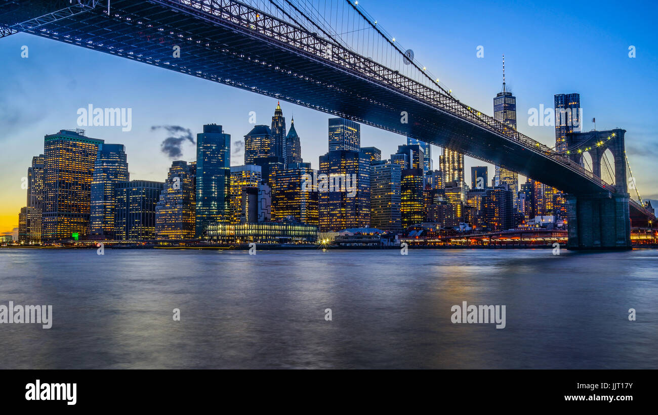 Brooklyn Bridge Park with Sunset and New York Skyline and East River ...