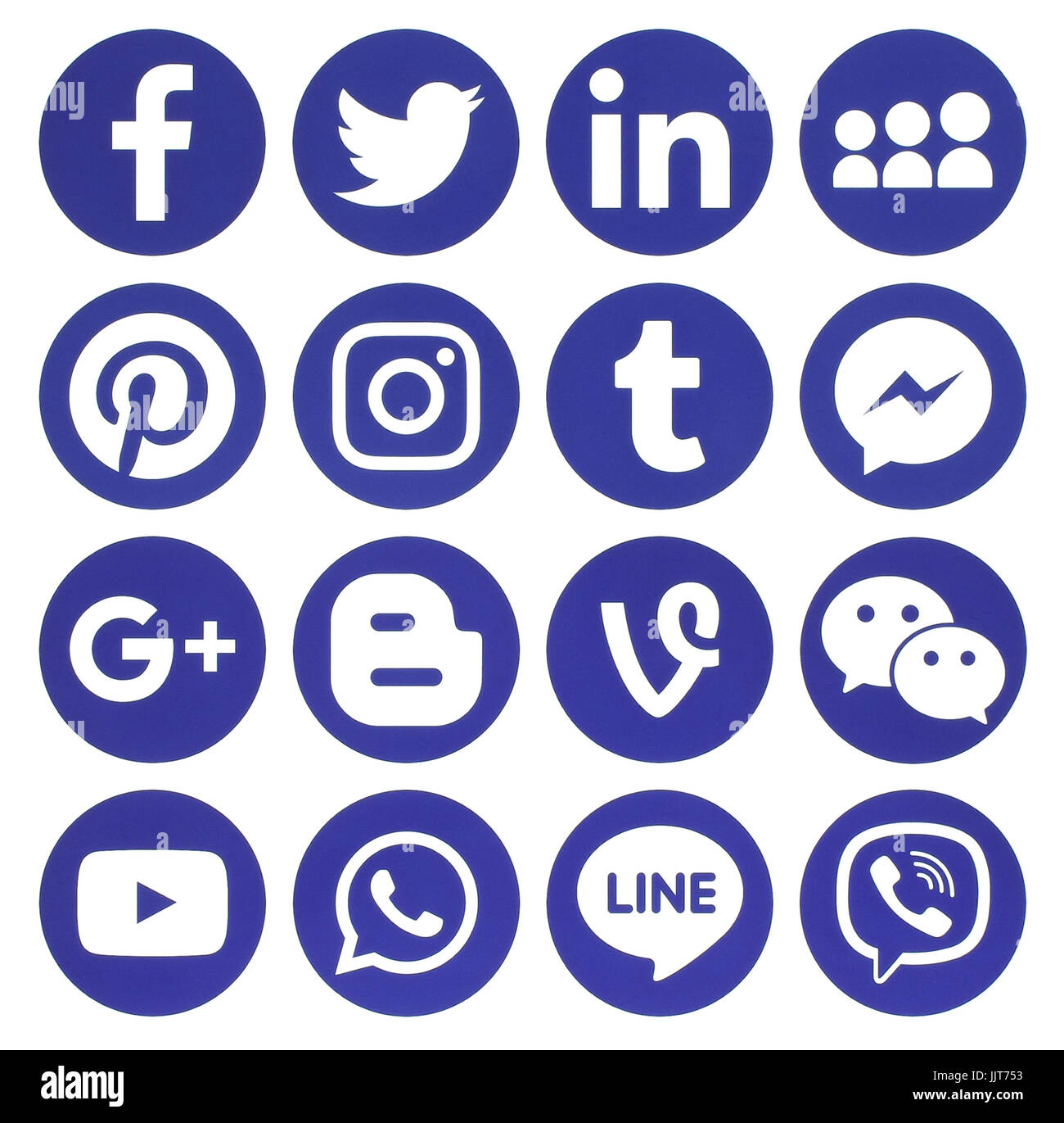 Kiev, Ukraine - February 13, 2017: Collection of popular blue round social media icons, printed on paper: Facebook, Twitter, Google Plus, Instagram, P Stock Photo