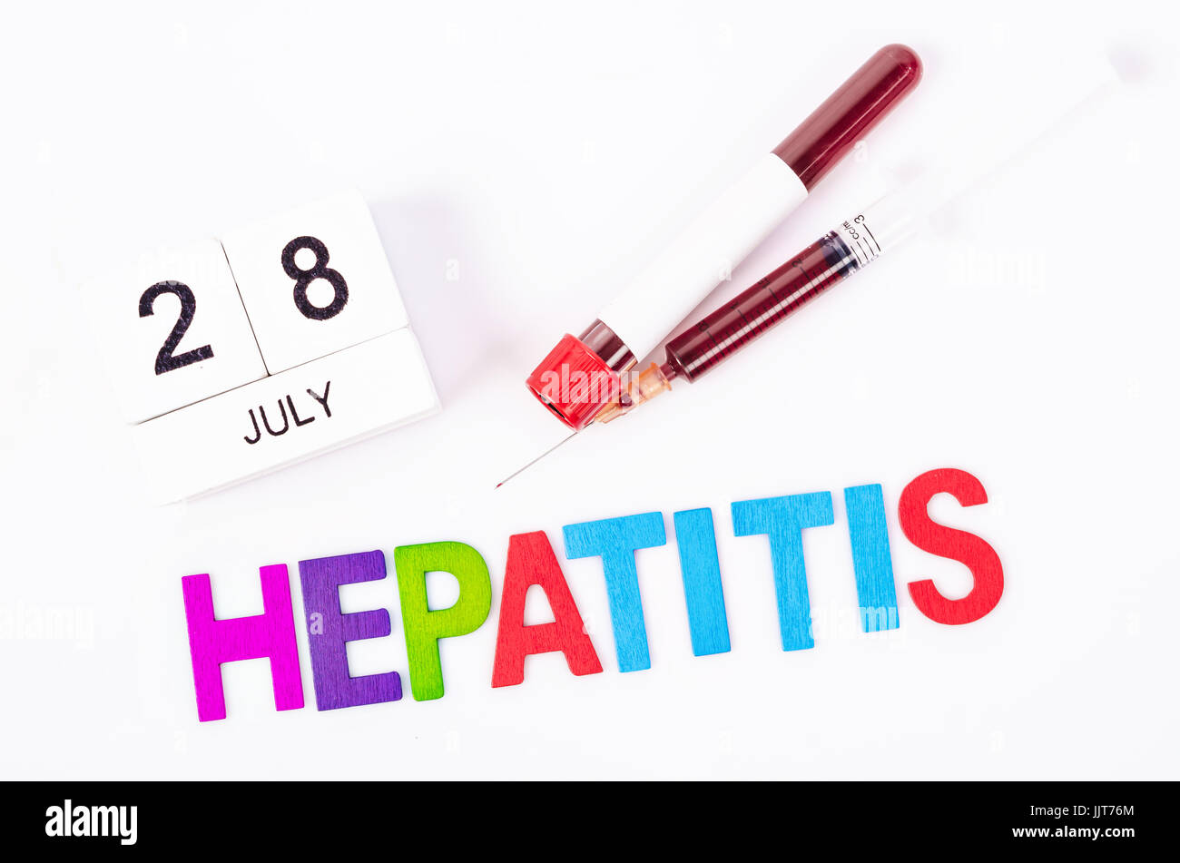 28 July calendar wood and sample blood with hepatitis wooden letters word. World hepatitis day concept. Stock Photo