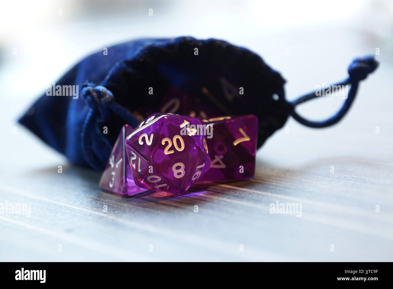 A set of polyhedral dice used for role playing games such as Dungeons & Dragons, the dice are used to determine how successful a player is in their ac Stock Photo