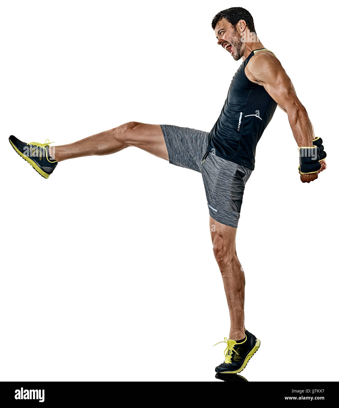 one caucasian fitness man exercising cardio boxing exercises in studio  isolated on white background Stock Photo